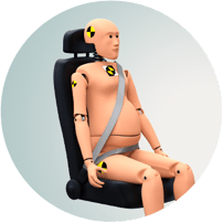 En testdocka sitter fastspänd i en bilstol